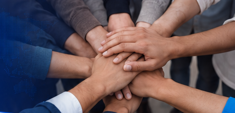Diverse team hands holding together